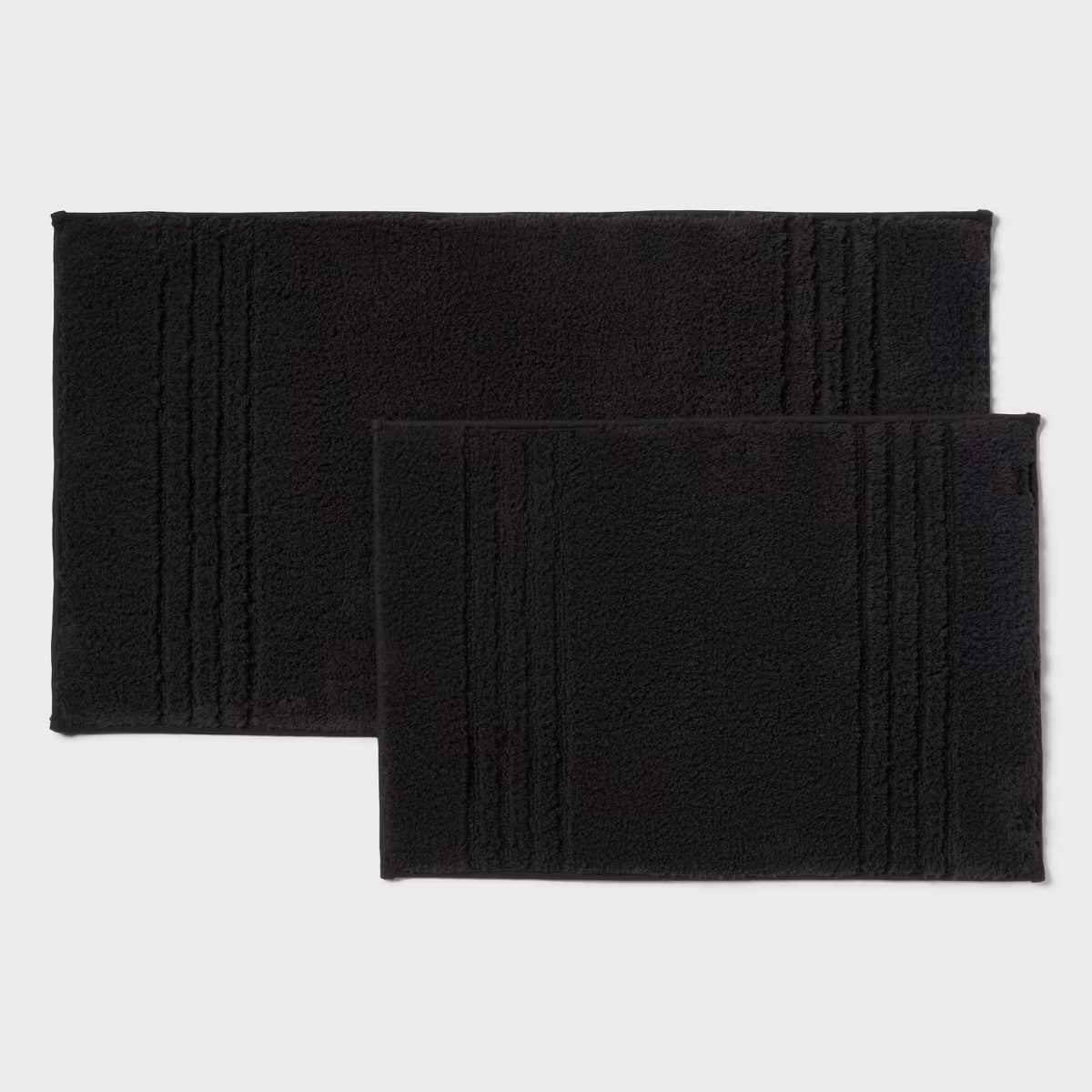 2pc 17"x24" and 20"x34" Textured Cotton Bath Rug Set Black - Threshold