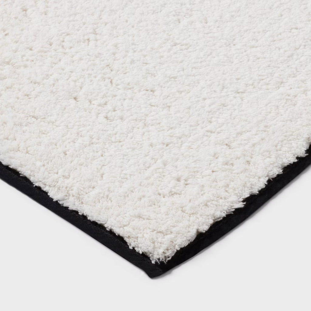 24"x36" Oversized Border Bath Rug Black/White - Threshold