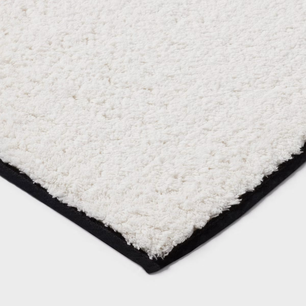 24"x36" Oversized Border Bath Rug Black/White - Threshold