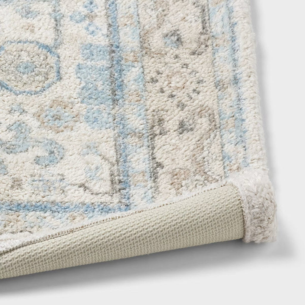 24"x36" Oversized Medallion Bath Rug Cream - Threshold
